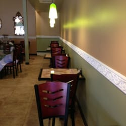 Kabob Palace - It'd be nice if there were booths on the side but there are these two seater tables.