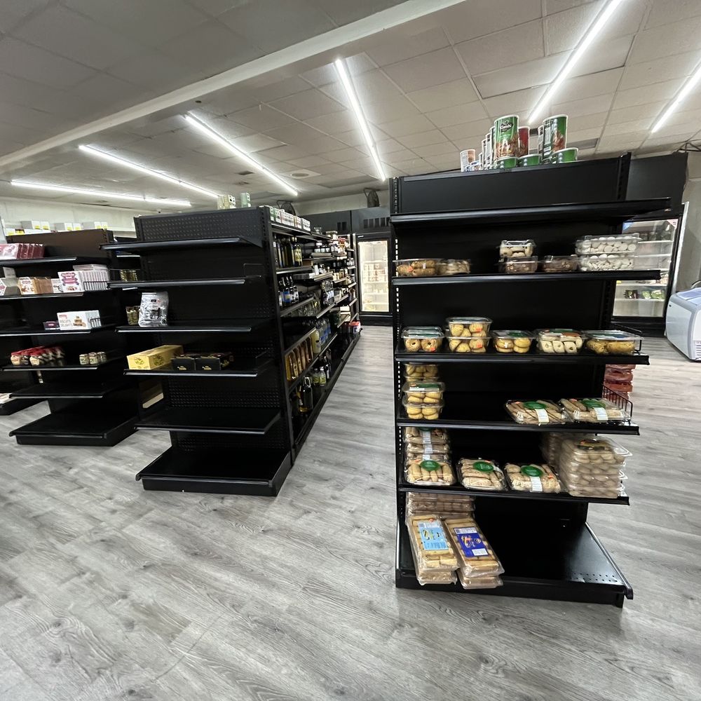 AL Madina - Looks like its a very busy store, i saw a lot of traffic coming through n buying - Delis Near Me - Brandon, Florida