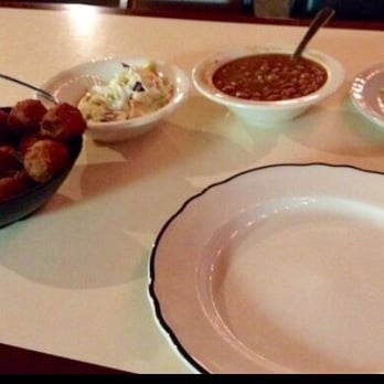 Shad's Catfish Hole - Coleslaw, brown beans, hushpuppies, pickles and onions come with every meal as well as your sides - Seafood Near Me - Sallisaw, Oklahoma Shad's Catfish Hole - Coleslaw, brown beans, hushpuppies, pickles and onions come with every meal as well as your sides - Seafood Near Me - Sallisaw, Oklahoma