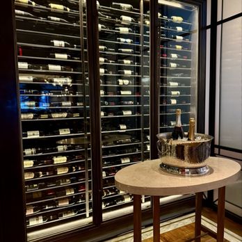Osteria La Baia - Wine wall with chilling champagne - Italian Near Me - New York, New York Osteria La Baia - Wine wall with chilling champagne - Italian Near Me - New York, New York