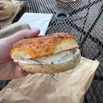 Bagel Kitchen - Cheddar bagel with regular cream cheese - Bagels Near Me - Grand Rapids, Michigan Bagel Kitchen - Cheddar bagel with regular cream cheese - Bagels Near Me - Grand Rapids, Michigan