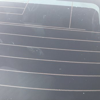 Pro Tint - Throughout... and bigger bubbles on other windows... as well as peeling from the side of the tint in the door windows. - Car Window Tinting Near Me - Louisville, Kentucky