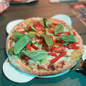 Pizza Station 826 - a pizza on a paper plate - Pizza Near Me - Hialeah, Florida Pizza Station 826 - a pizza on a paper plate - Pizza Near Me - Hialeah, Florida