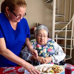 Wedgewood of Winter Haven Inc - Lunch that o was able to bring from home.  Here I am having lunch with her, Idalia, another nurse fixing her meal