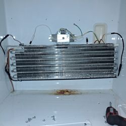 Clark-Rothschild Appliance Repair - Your upright freezer is not cooling. Let us fix it by replacing that leaking freon coil