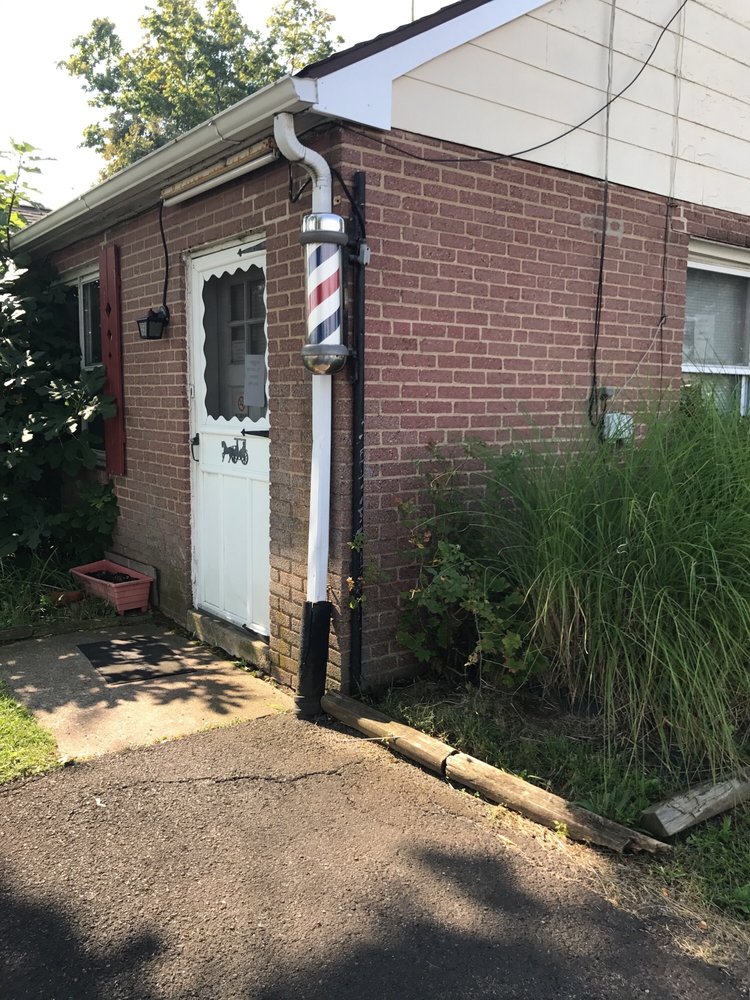 John Busa's Barber Shop Logo