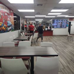 Rallys - 12:00 am 5/31/25 I have videos. Worst service. Girl w/headset taking orders was sitting at a table w/ girlfriend. She wasnt taking orders.