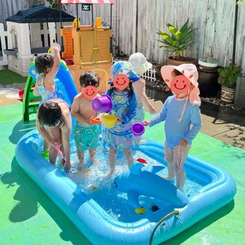 Tiny Big Steps Childcare - Water play in summer - Child Care & Day Care Near Me