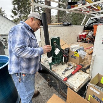 Legacy Building & Engineering Construction - Assembling the 2 inch discharge for the new pump for the lift station - Plumbing Near Me Legacy Building & Engineering Construction - Assembling the 2 inch discharge for the new pump for the lift station - Plumbing Near Me