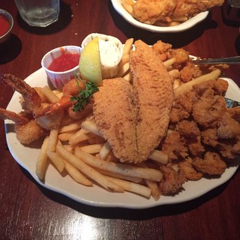 Pappadeaux Seafood Kitchen - Sampler platter gets you a good portion of fish, crawfish, shrimp, and fries! - Seafood Near Me - Austin, Texas