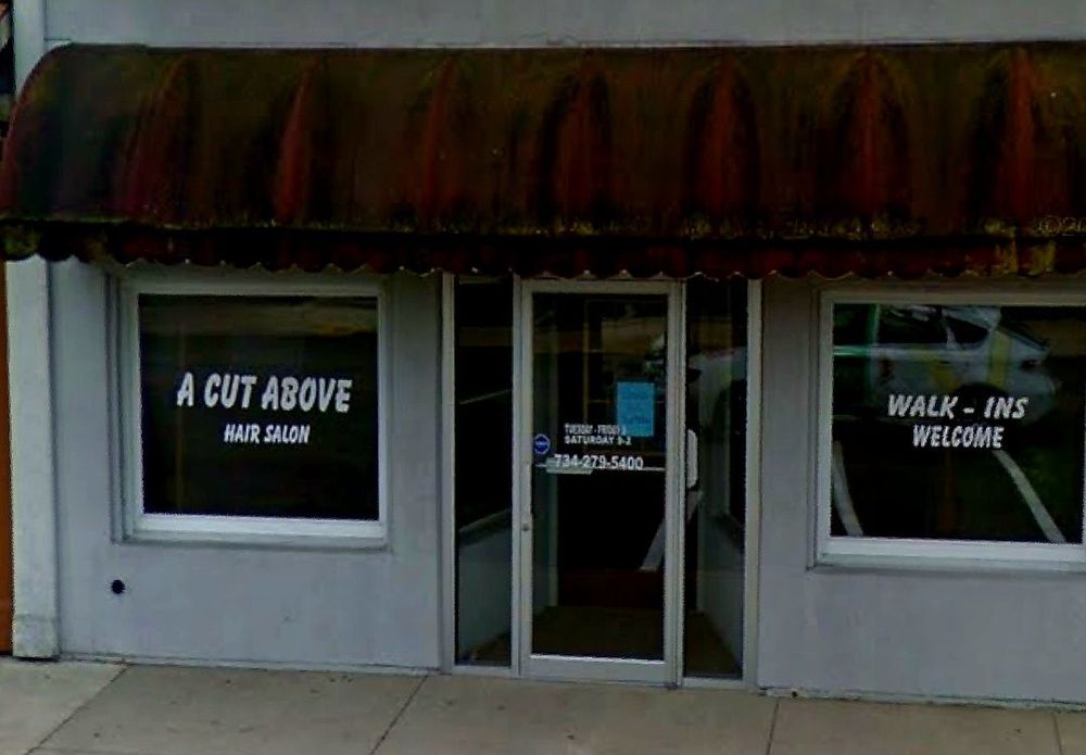 A Cut Above Hair Salon Logo