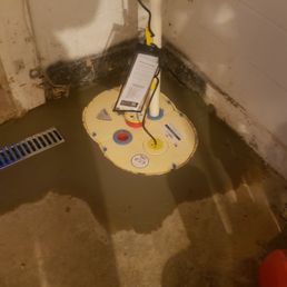 New Sump Pump installed with trench drain New Sump Pump installed with trench drain