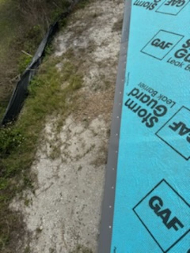 Slide of Sims Roofing