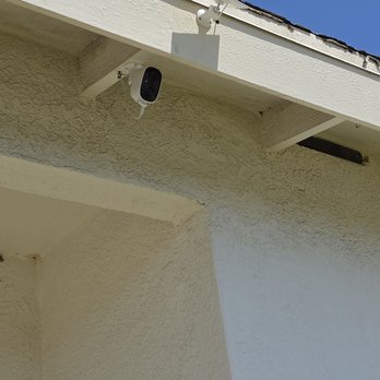 Salambek Handyman - Installation of solar panels for security cameras in the front of the house and backyard on the garage. - Tiling Near Me - Los Angeles, California