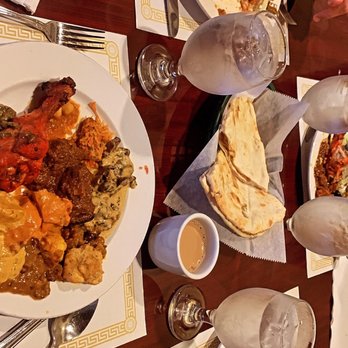 Taste Of India - a table full of indian food - Indian Near Me - Buffalo, New York Taste Of India - a table full of indian food - Indian Near Me - Buffalo, New York