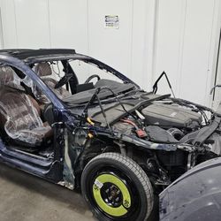 Xtreme Collision Repair - what the shop did to repair the passenger side damage. the repair was never completed and the car was declared a total loss.