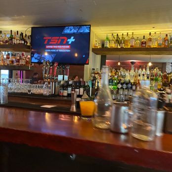 Stonesedge Kitchen - a bar with many bottles of alcohol - Breakfast & Brunch Near Me - Whistler, British Columbia