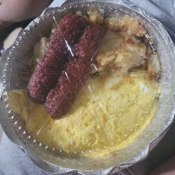 Cheese omelet, beef sausage, and home fries