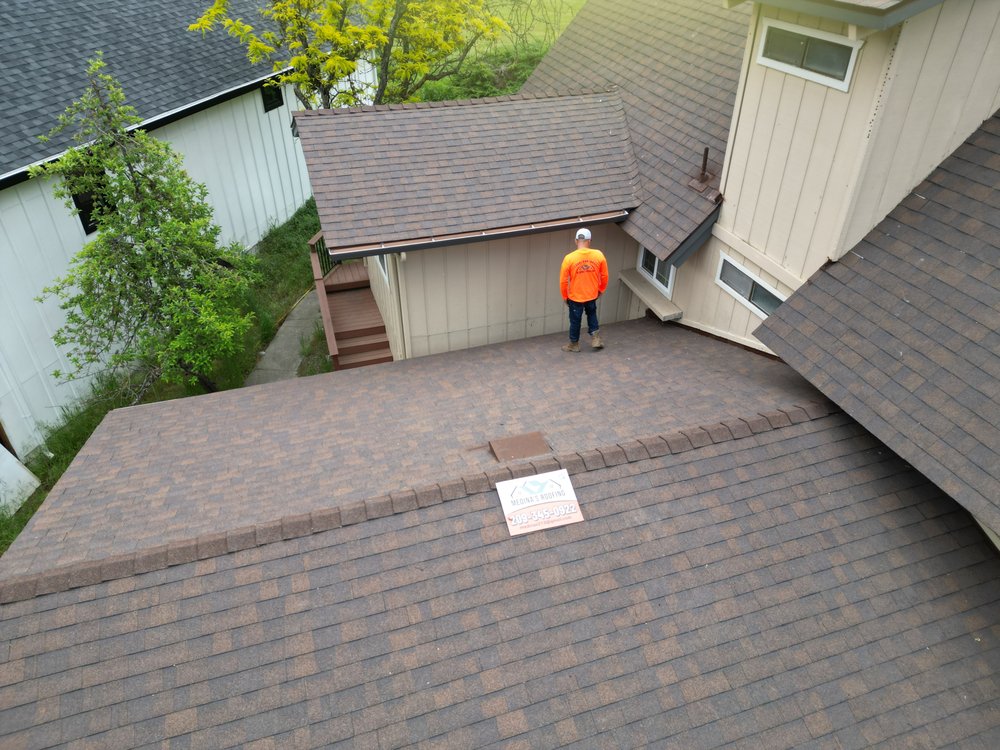 Slide of Medina's Roofing