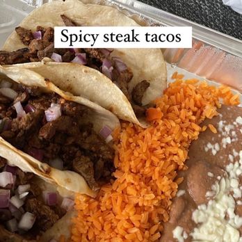 Mi Cancun - Spicy steak tacos with refried beans and rice - Mexican Near Me - Morrisville, North Carolina Mi Cancun - Spicy steak tacos with refried beans and rice - Mexican Near Me - Morrisville, North Carolina