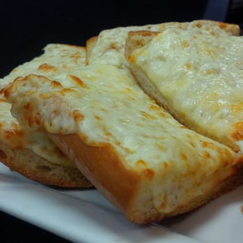 Scotty's - Garlic bread - the good type of crunchy & cheesy! - Canadian (New) Near Me - Barrie, Ontario