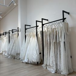 Bridal salon filled with intricately detailed wedding dresses
