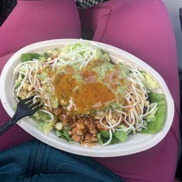 Salad with sofritas (tofu), black beans, corn salsa, cheese, guac, and Chipotle salad dressing. Salad with sofritas (tofu), black beans, corn salsa, cheese, guac, and Chipotle salad dressing.