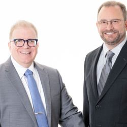 Sprigg-Novak Law Firm, PLLC - Craig Novak and Jeff Sprigg