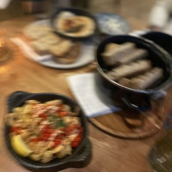The Wheel - P.E.I. Mussels Pot (right), Bruleed Goat Cheese (top), R.I. Style Calamari (left)...blurry due to fun and wine!! - New American Near Me - Stamford, Connecticut The Wheel - P.E.I. Mussels Pot (right), Bruleed Goat Cheese (top), R.I. Style Calamari (left)...blurry due to fun and wine!! - New American Near Me - Stamford, Connecticut