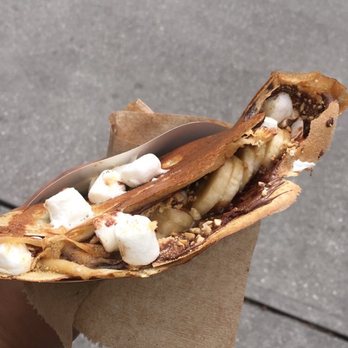 The Crêpe Company - Nutella and banana crepe with addition of marshmallows, nuts, caramel, and graham crackers. - Food Trucks Near Me The Crêpe Company - Nutella and banana crepe with addition of marshmallows, nuts, caramel, and graham crackers. - Food Trucks Near Me
