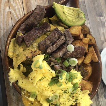 Eggscellent - Chilaquiles with green sauce, potatoes and steak ! - Breakfast & Brunch Near Me - Las Vegas, Nevada Eggscellent - Chilaquiles with green sauce, potatoes and steak ! - Breakfast & Brunch Near Me - Las Vegas, Nevada