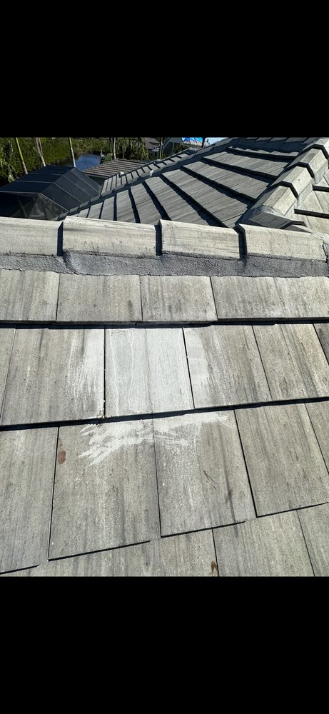 Slide of Quick Roofing