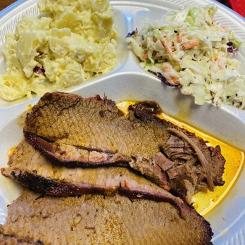 Cooper's Bar-B-Q - Lean cut brisket dipped in BBQ - Barbeque Near Me - Christoval, Texas