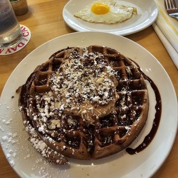 Day Maker Half Day Cafe - German chocolate waffle and sunny side up egg - Breakfast & Brunch Near Me - Austin, Texas