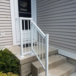 Handy Guy, LLC - Metal handrail added for odd shaped stoop