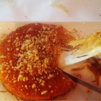 Turkish Grill - Kenefe. Dessert, crispy semalina, melted mozzarella inside, topped with pistachio and drizzled with honey.yum!! - Turkish Near Me - Sunnyside, New York Turkish Grill - Kenefe. Dessert, crispy semalina, melted mozzarella inside, topped with pistachio and drizzled with honey.yum!! - Turkish Near Me - Sunnyside, New York