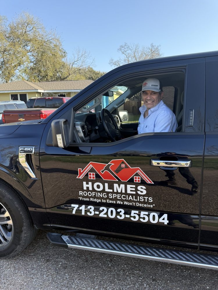 Slide of Holmes Roofing Specialists