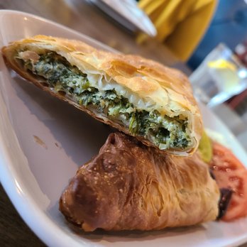 Acropolis Greek Taverna - puff pastry with spinach filling - Mediterranean Near Me - Tampa, Florida Acropolis Greek Taverna - puff pastry with spinach filling - Mediterranean Near Me - Tampa, Florida