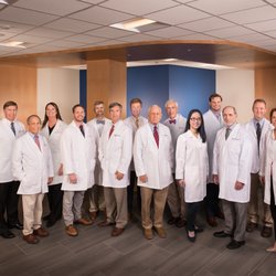 Columbia Eye Clinic - L to R: Front Row - William F. Crosswell, M.D.; Derrick A. Huey, M.D.; R. Mitchell Newman, Jr., M.D.' Hal H. Crosswell, Jr., M.D.; Sarah Lee