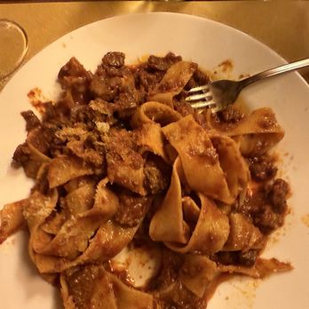 Pensavo Peggio - Pappardella al Cinghiale. Amazing pappardella tossed in a red sauce with wild boar. - Italian Near Me - Florence, FI Pensavo Peggio - Pappardella al Cinghiale. Amazing pappardella tossed in a red sauce with wild boar. - Italian Near Me - Florence, FI
