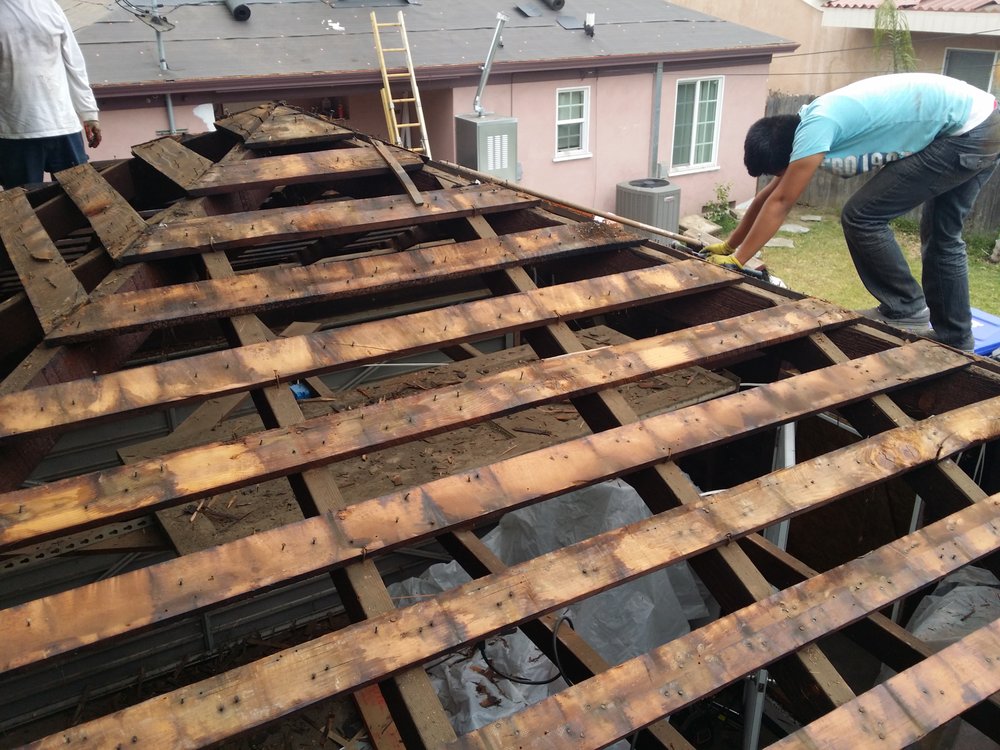 Slide of Tim Outzen Roofing