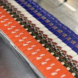 Printing Services - 2 Friends Printing - Folders provide the soundtrack for the bindery - whack...whack...whack