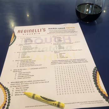 Reginelli's Pizzeria - Fun Mardi Gras Trivia and my short glass of wine - Pizza Near Me - New Orleans, Louisiana