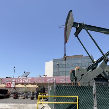 Curley's Cafe - an oil pump in a parking lot - American Near Me - Signal Hill, California Curley's Cafe - an oil pump in a parking lot - American Near Me - Signal Hill, California