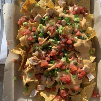 Open Space Tap Room - Chicken Nachos---so good! A bit of spicy creamy cheese sauce combined all good ingredients to get your taste bud happy! - Salad Near Me - SeaTac, Washington Open Space Tap Room - Chicken Nachos---so good! A bit of spicy creamy cheese sauce combined all good ingredients to get your taste bud happy! - Salad Near Me - SeaTac, Washington