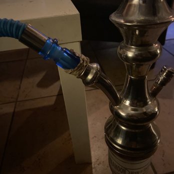 Village Hookah Lounge - a hookah on a table - Hookah Bars Near Me - Lake Forest, California Village Hookah Lounge - a hookah on a table - Hookah Bars Near Me - Lake Forest, California
