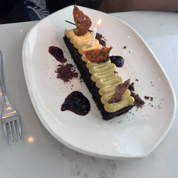 360 Restaurant - DARK CHOCOLATE AND HAZELNUT CAKE (GF)  Hazelnut praline, tonka bean cream, haskap berry compote, cocoa tuile - Canadian (New) Near Me - Toronto, Ontario