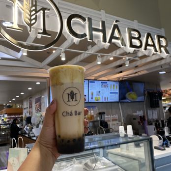 M Chá Bar - a hand holding a cup of coffee - Bubble Tea Near Me - Mississauga, Ontario M Chá Bar - a hand holding a cup of coffee - Bubble Tea Near Me - Mississauga, Ontario