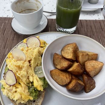 Grand Social - Avocado toast with eggs and side of roasted potatoes - Lounges Near Me - San Diego, California Grand Social - Avocado toast with eggs and side of roasted potatoes - Lounges Near Me - San Diego, California