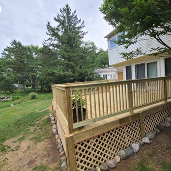 Titan Decks - Pressure treated wood deck rebuild. - Decks & Railing Near Me - Wixom, Michigan Titan Decks - Pressure treated wood deck rebuild. - Decks & Railing Near Me - Wixom, Michigan